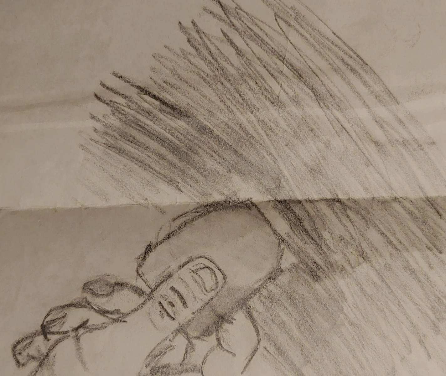 La mano y la goma de borrar