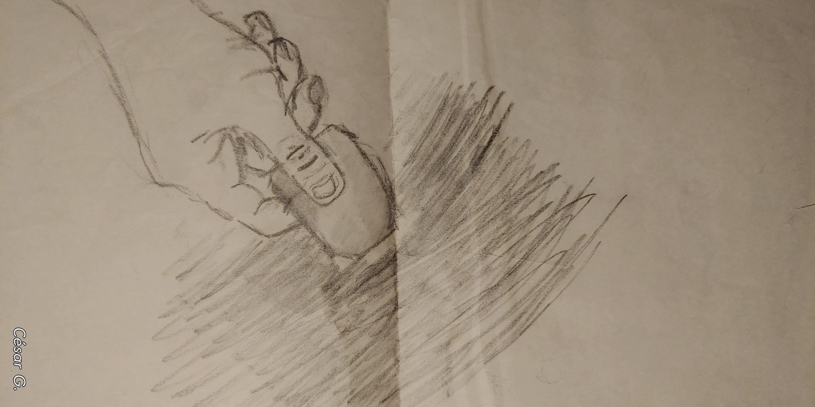 La mano y la goma de borrar